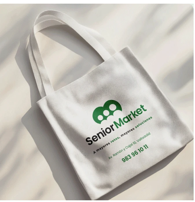 Natural canvas tote bag printed with the Senior Market logo, slogan, store address and phone number